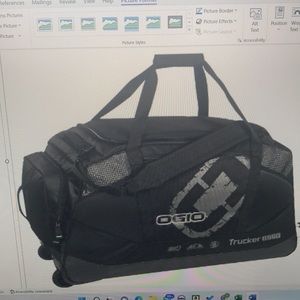 Never used OGIO TRUCKER 8800 black outside/red interior - great motorcycle gear